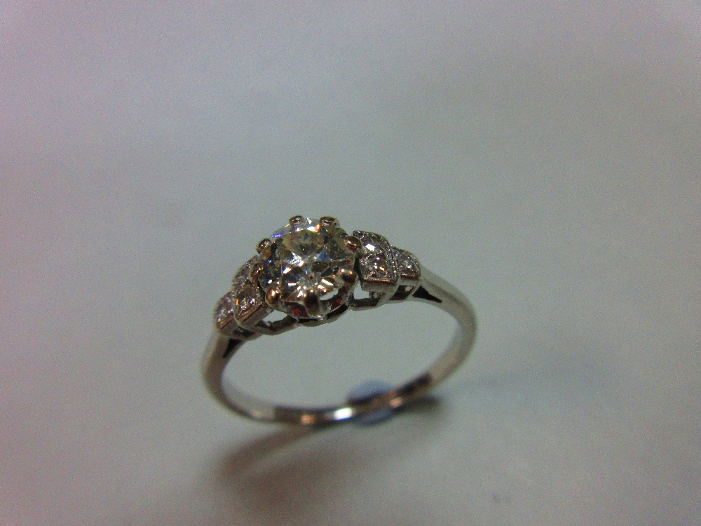A diamond ring, the old round brilliant cut diamond claw set between stepped square millegrain edged - Image 5 of 5