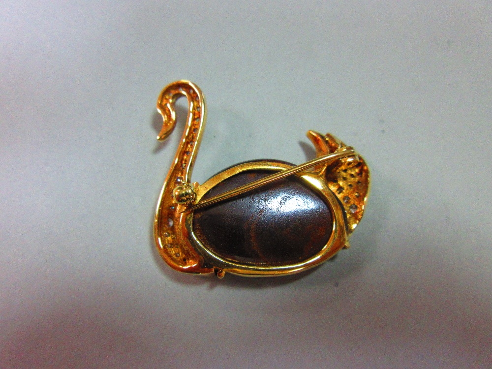 An opal and diamond brooch in the form of a swan, the body of the swimming bird formed by an ovoid - Image 4 of 5