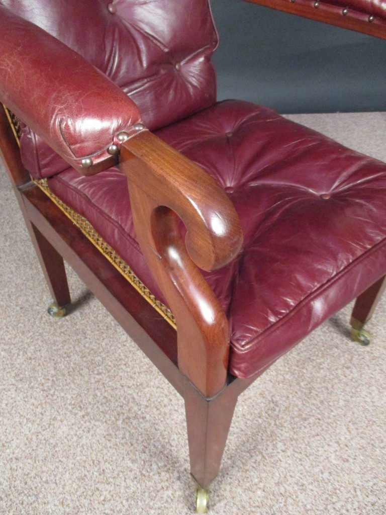 A Regency mahogany library bergere, the arms upholstered in red leather, cane seat with loose - Image 3 of 4