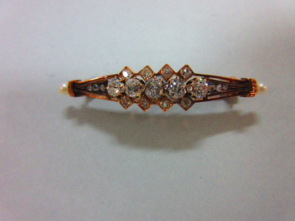 An antique diamond and pearl brooch, designed as a pierced and tapered slightly convex line with - Image 2 of 6