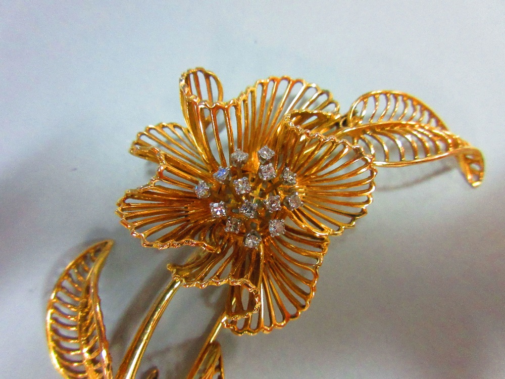 A mid-20th century diamond set flower brooch, of open wirework structure with three curled leaves - Image 5 of 5