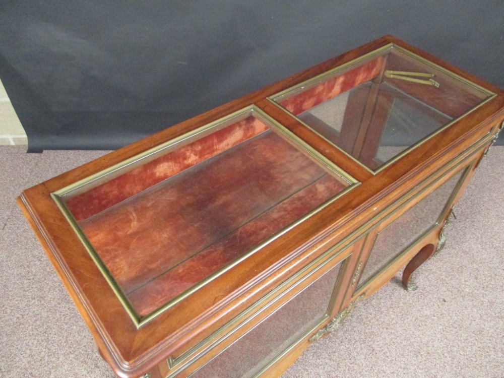 A French Transitional style mahogany and gilt mounted vitrine, circa 1900, the hinged glazed top - Image 2 of 3