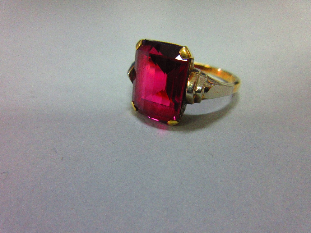 An Austrian single stone synthetic red spinel ring, the fancy cut rectangular pinky-red spinel, claw - Image 2 of 8