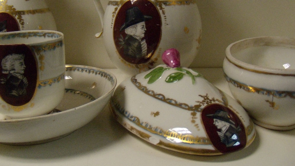 A late 18th/early 19th century Vienna porcelain part coffee service, each painted with grisaille - Image 4 of 7