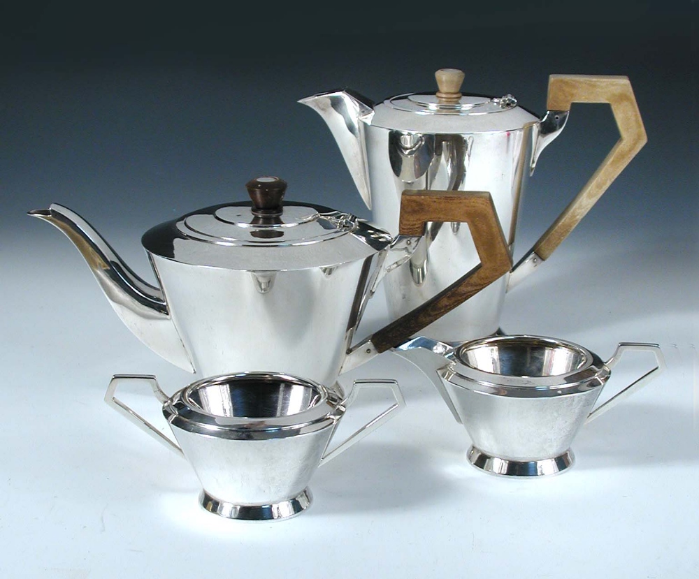 An Art Deco style silver four piece tea set, by The Barker Brothers, Birmingham 1935, comprising a