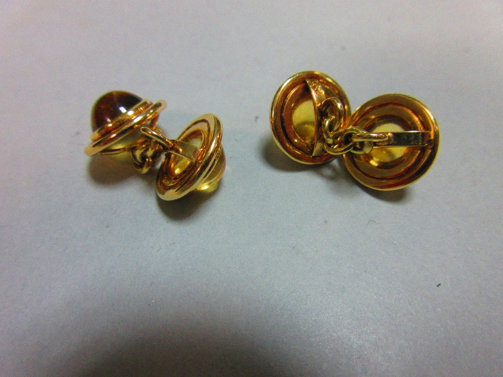 A pair of citrine set double ended cufflinks, each end with a round cabochon pale gold citrine - Image 2 of 2