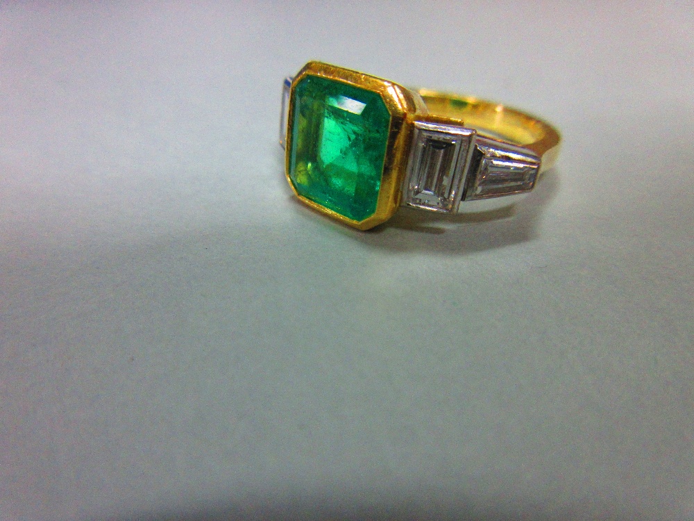 An 18ct gold emerald and diamond ring by Theo Fennell, the near-square emerald cut emerald, - Image 3 of 8