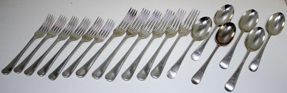 A matched service of silver Old English pattern flatware, comprising:- six table forks by The