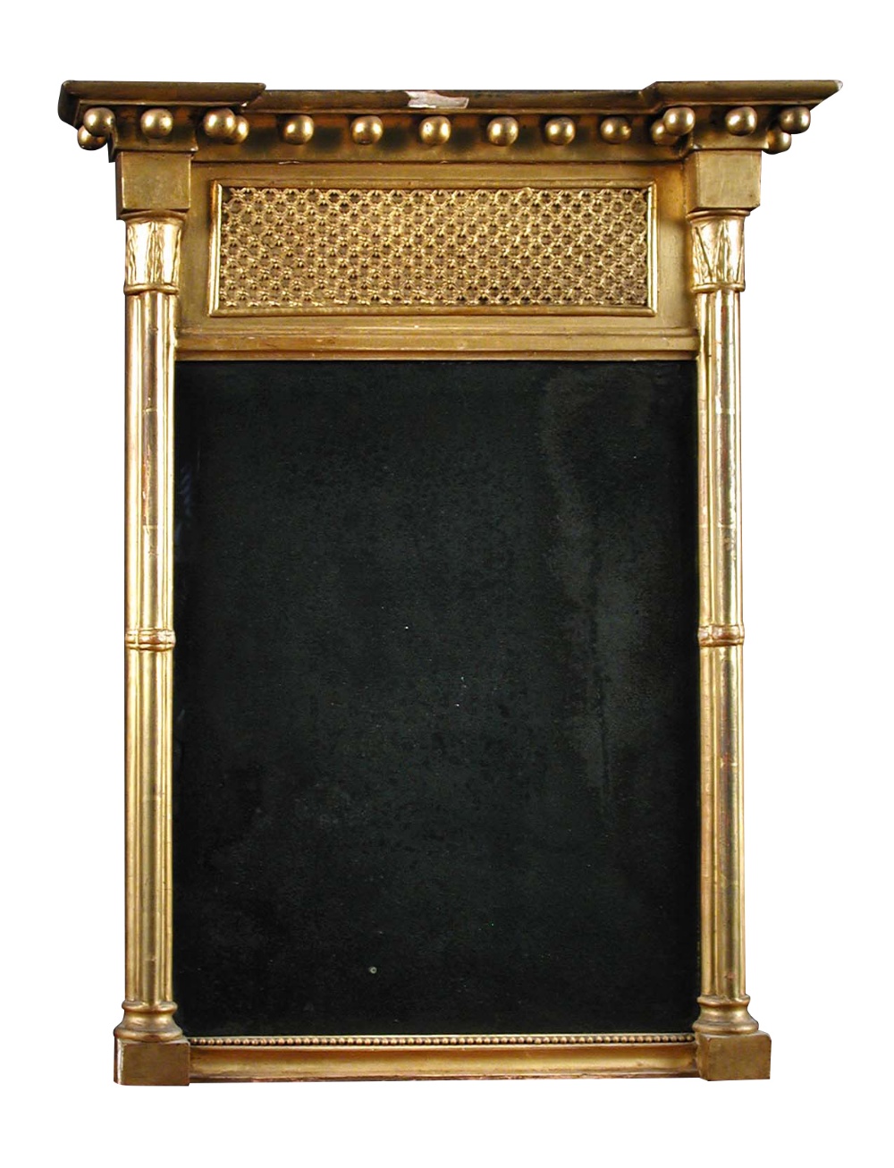 A small Regency gilt framed pier glass, with a ball moulded frieze and cluster moulded column