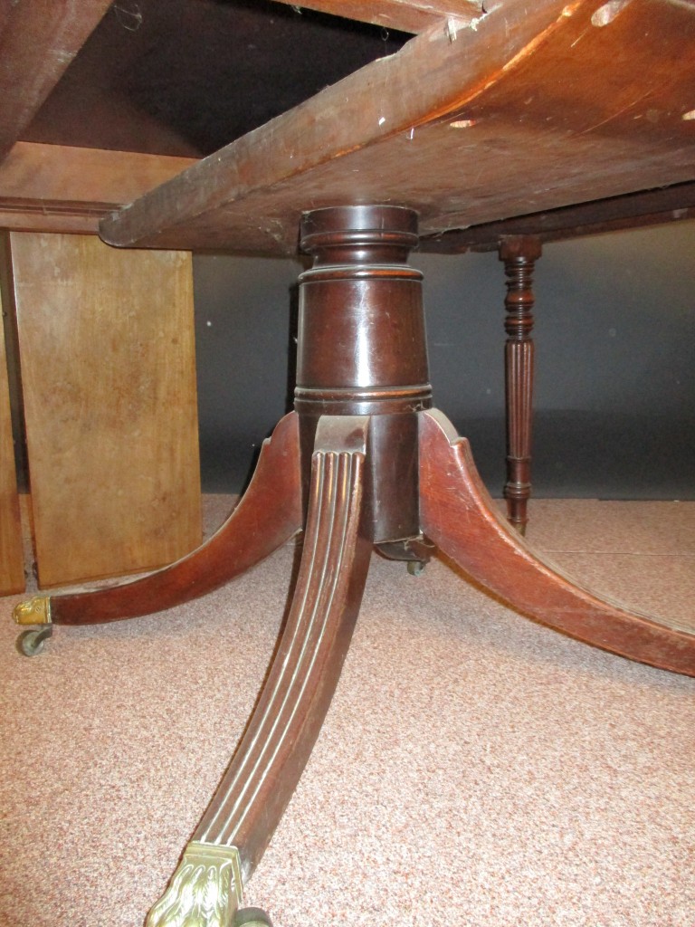 A Regency mahogany extending pedestal dining table, with folding gadroon moulded legs, supporting - Image 2 of 4