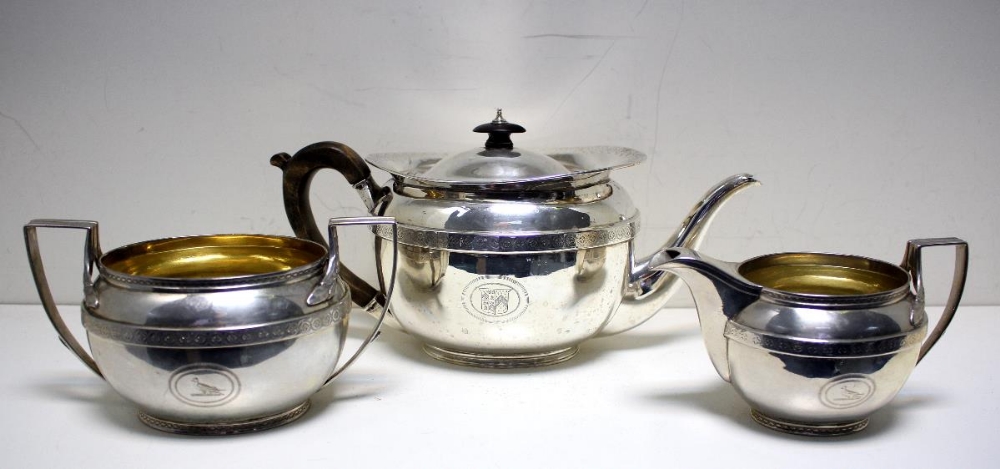 A George III silver three piece tea set by John Emes, London circa 1805, comprising a teapot of oval - Image 2 of 11