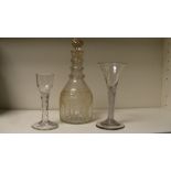 Two 18th century glasses together with an Irish decanter and stopper, the cordial with facetted stem