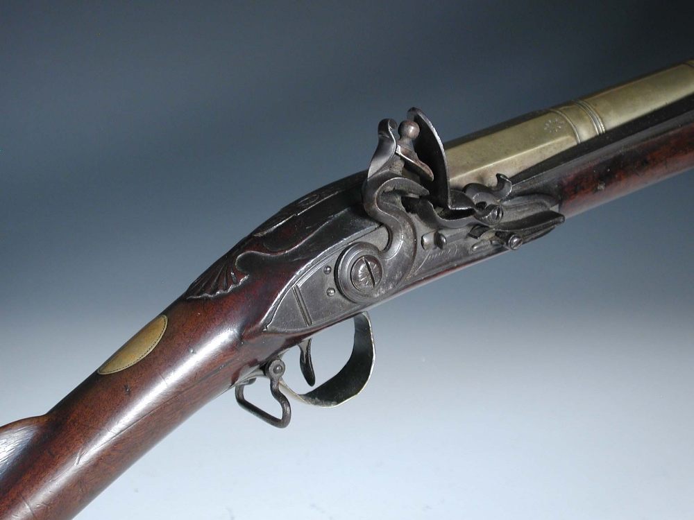 A late 18th century Blunderbuss by Jover, London with belled brass barrel in three stages with a