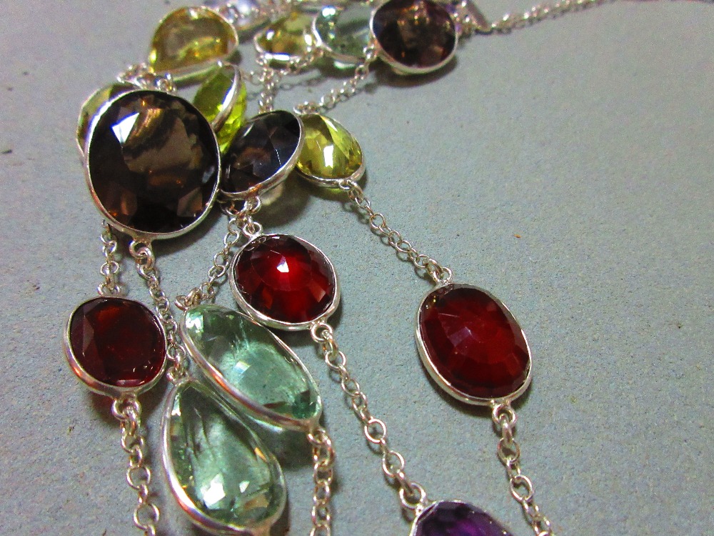 A five strand multi gemset necklace, composed of oval cut hessonite garnets, prasiolites, amethysts, - Image 7 of 7