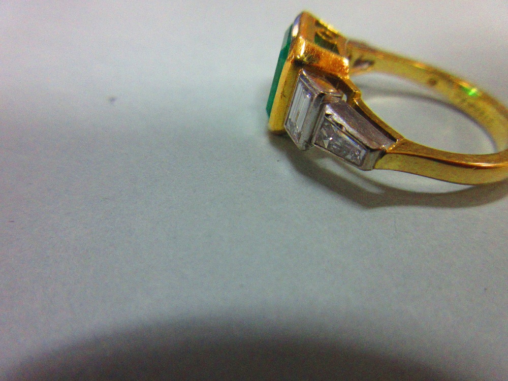 An 18ct gold emerald and diamond ring by Theo Fennell, the near-square emerald cut emerald, - Image 7 of 8