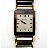 By Rado - a unisex 'Diastar' steel , titanium and gold plated quartz wristwatch, the rectangular