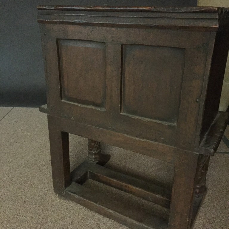 A Tudor revival oak pew seat, with castellated crest rail and linenfold panel back and sides, on - Image 3 of 3