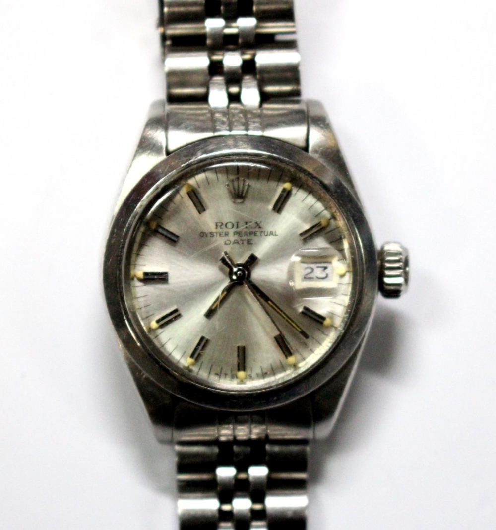 By Rolex - a lady's steel cased 'Oyster Perpetual Date' automatic wristwatch, silvered dial with