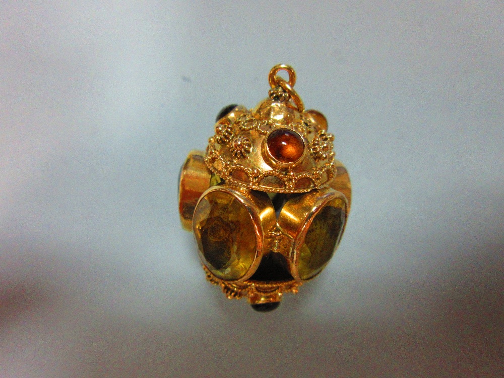 An ornate citrine set pendant, designed as five oval cut and collet set lemon citrines forming a - Image 2 of 6