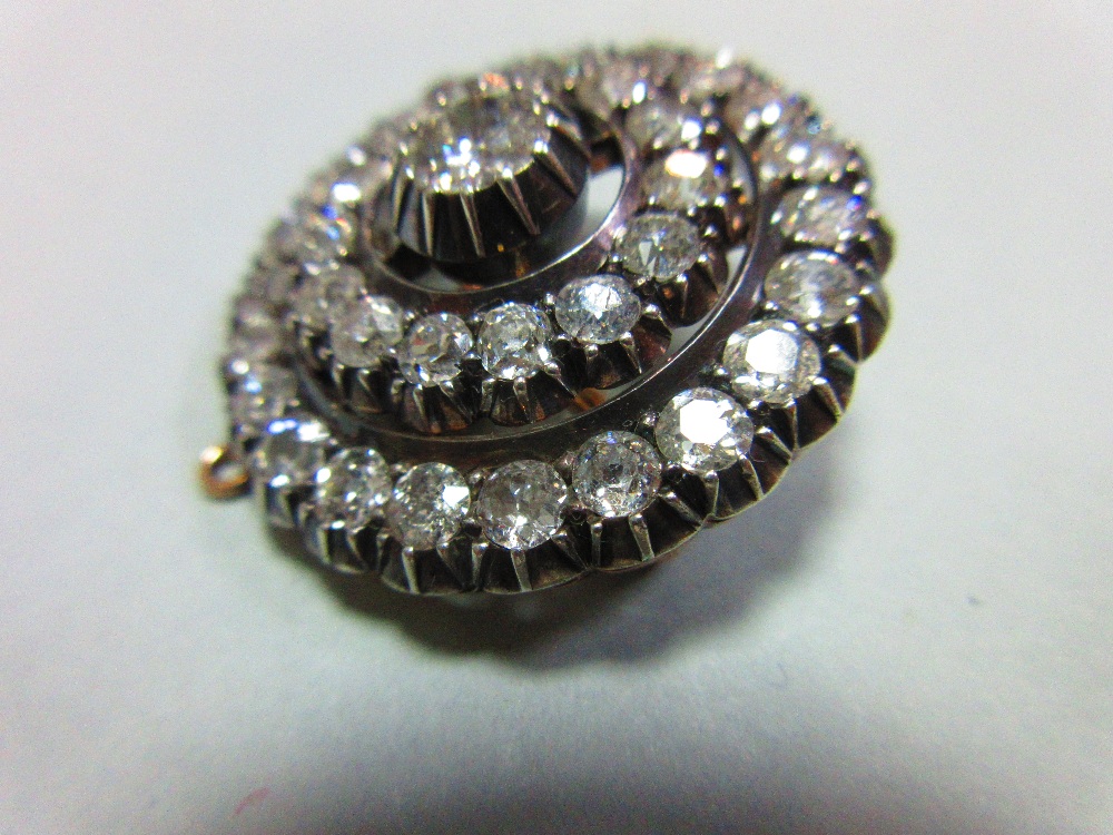 A Victorian diamond target brooch / pendant, the central old round brilliant cut diamond set above - Image 4 of 4