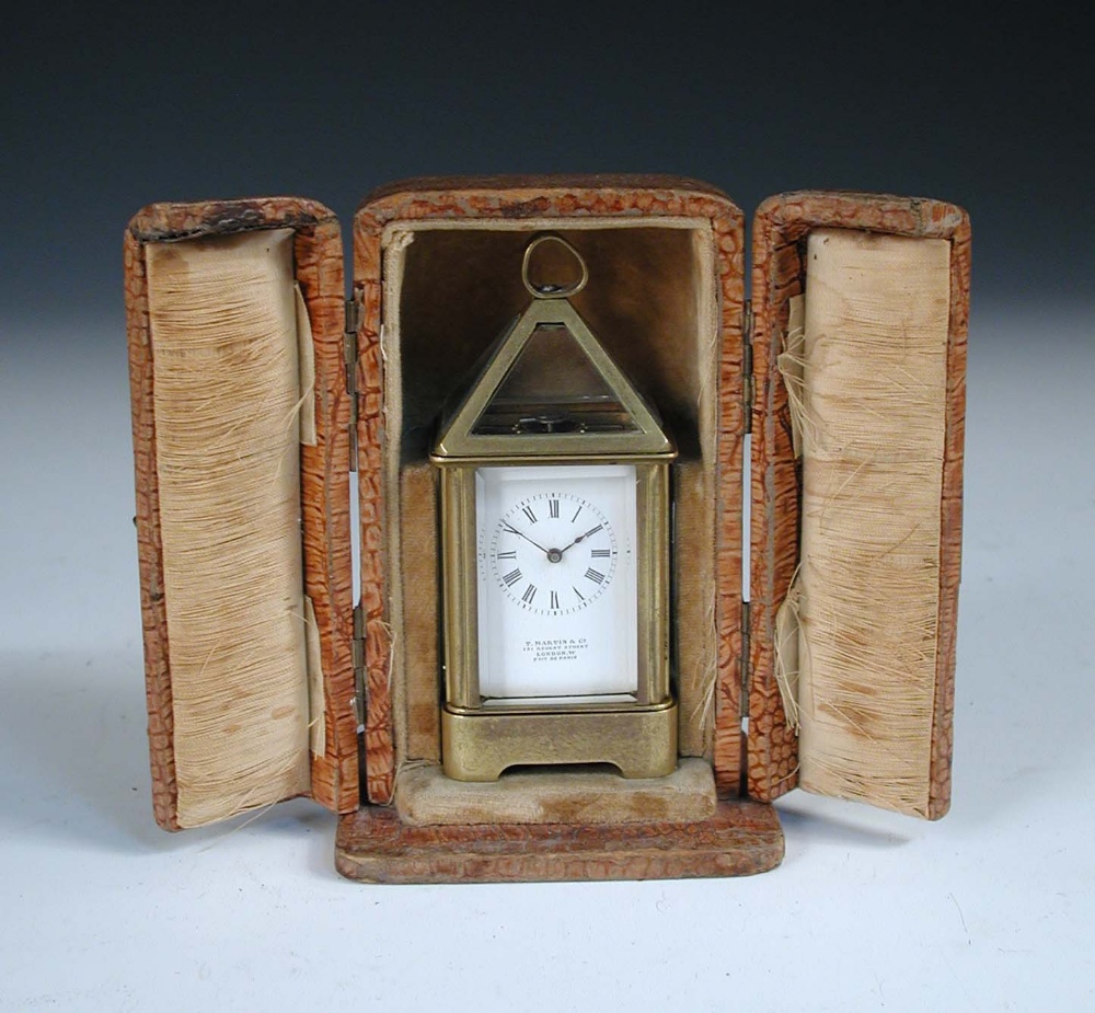 A French miniature lantern style carriage timepiece, circa 1900, with pyramid glazed top above