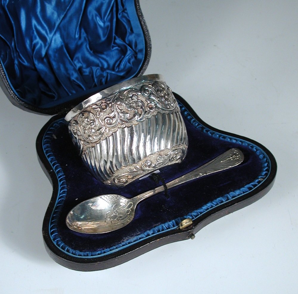 A late Victorian silver porringer and spoon, the porringer by James Wakely & Frank Clarke Wheeler,