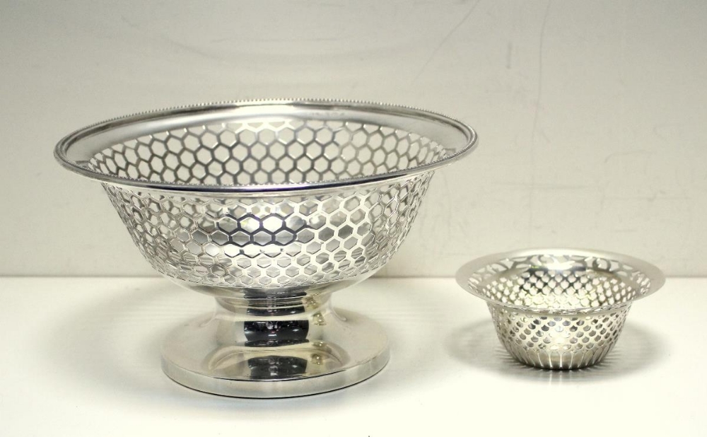 A silver fruit or cake basket, by the Gorham Manufacturing Co, Birmingham 1912, of plain round