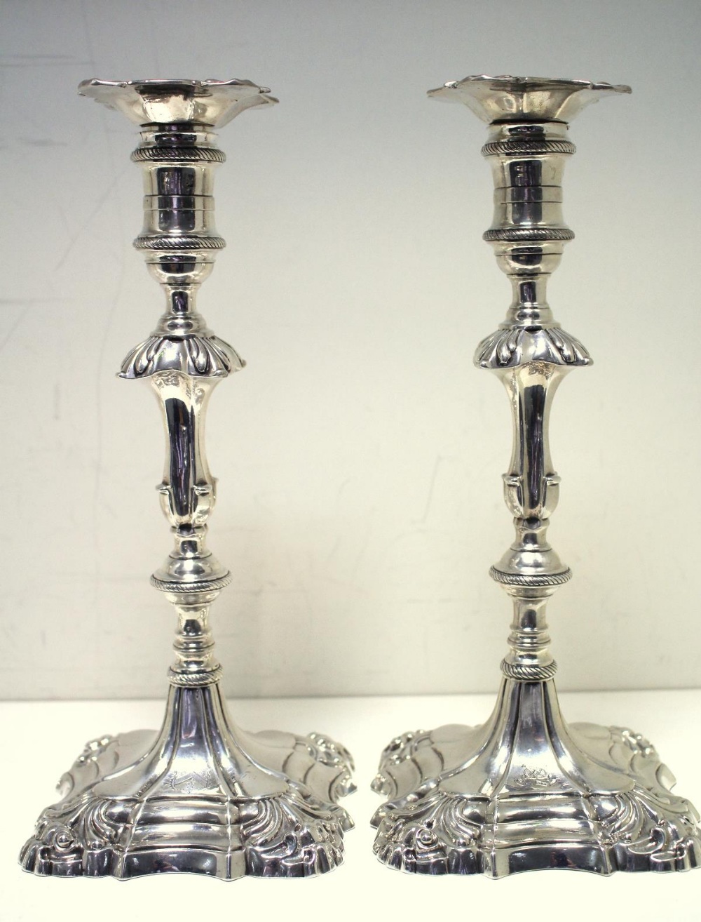 Two pairs of silver candlesticks, by Ebenezer Coker, London 1766/1767, each raised from a square - Image 3 of 11