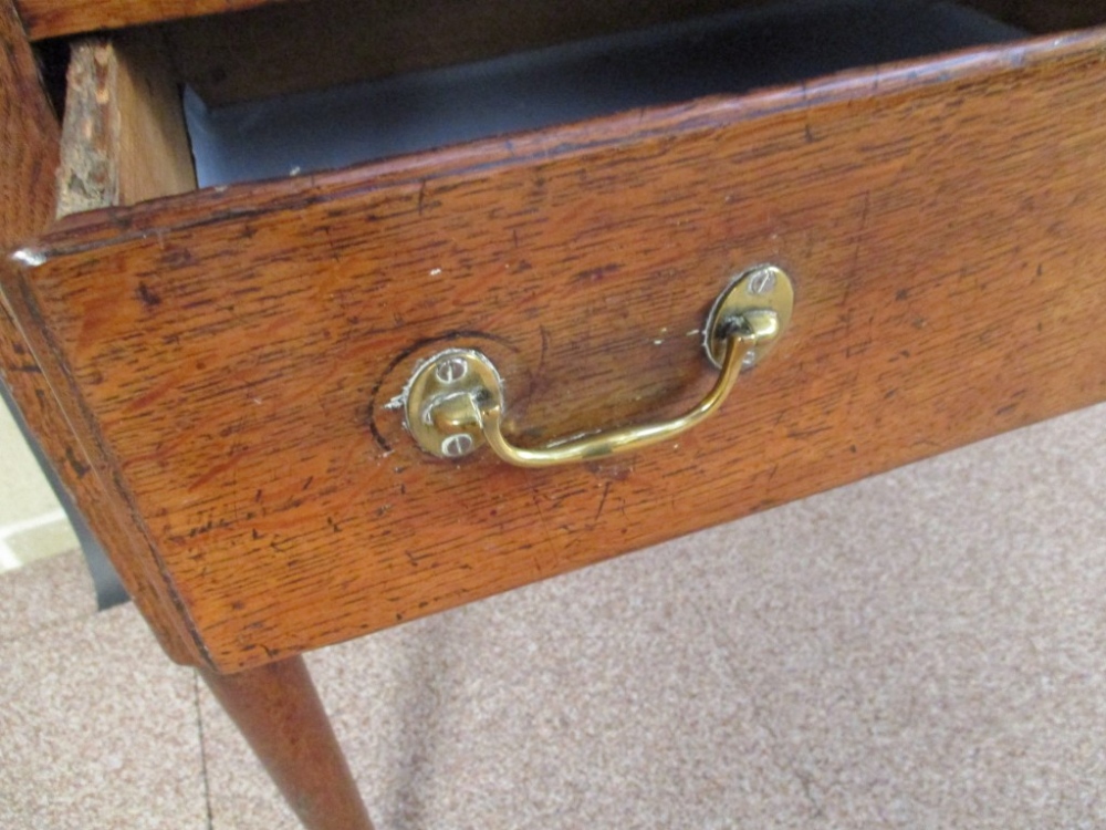 A George III oak dresser base, fitted three drawers with brass handles, shaped fret carved apron - Image 3 of 5