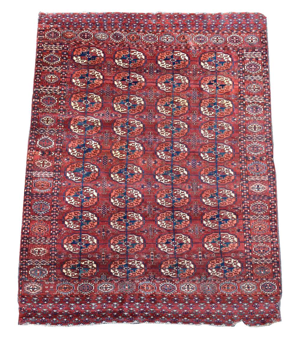 A Tekke Turkman carpet, 281 x 186cm (110 x 73in) Repairs to the corners and one small length of