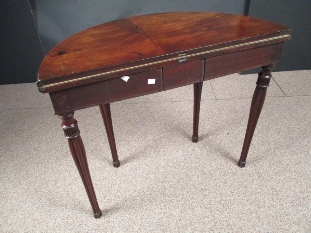 A George IV mahogany demi lune card table, with foldover top, green velvet lined interior, on - Image 4 of 5