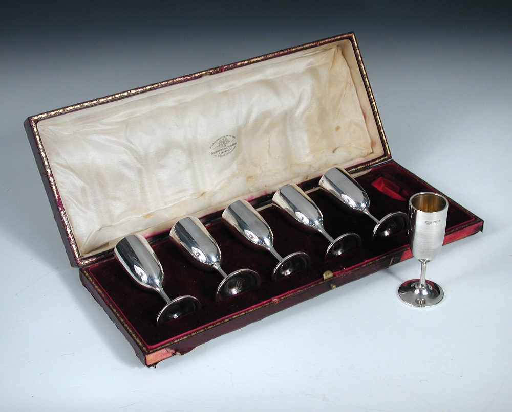 A set of six small silver liqueur goblets, by The Goldsmiths' and Silversmiths' Company, London