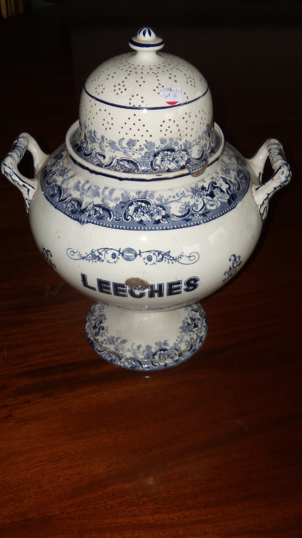 A 19th century blue and white pearlware 'Leeches' jar and pierced cover, the compressed spherical - Image 2 of 3