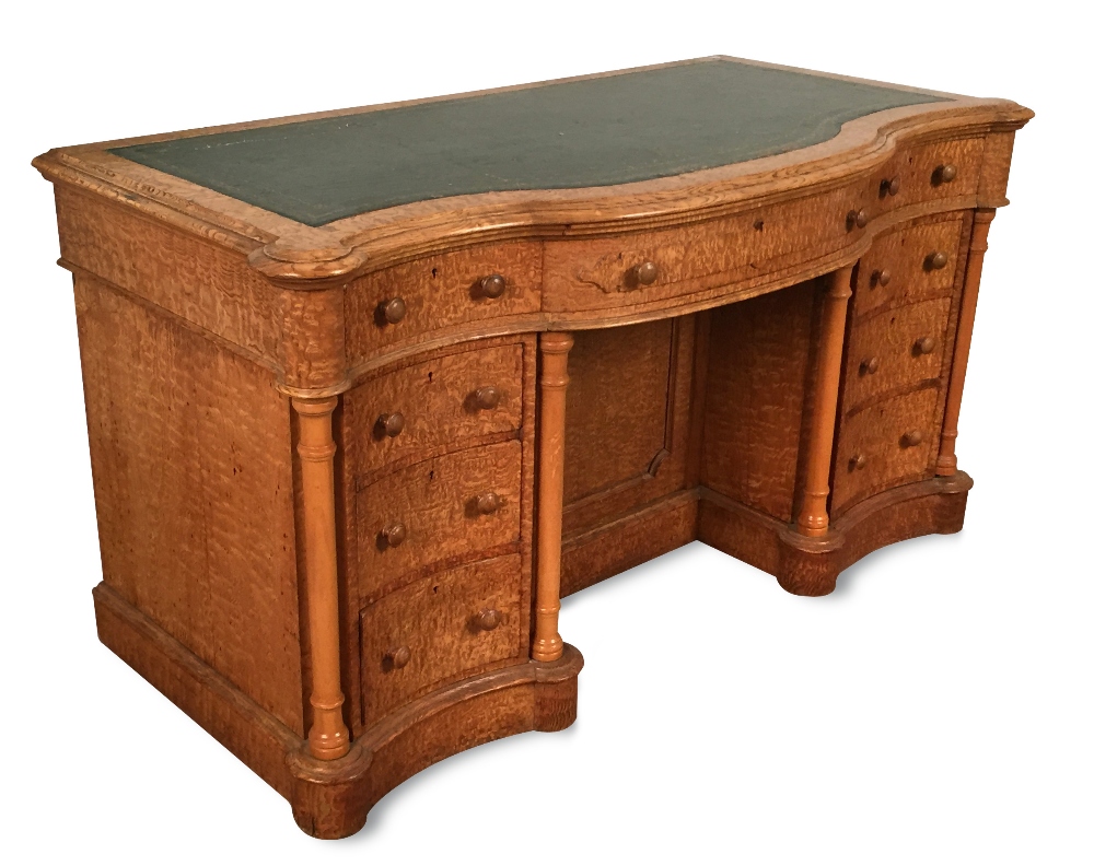 A Victorian figured ash pedestal desk, stamped Taylor & Sons, New Bond Street, London, of serpentine