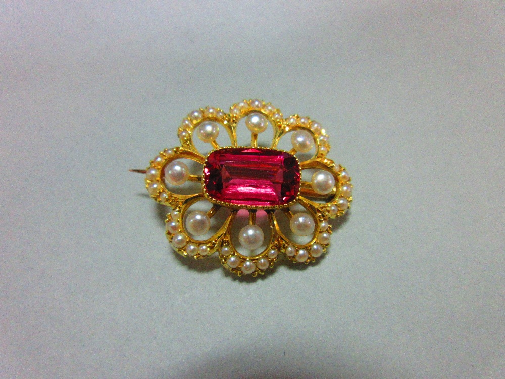 A pink tourmaline, pearl and seed pearl brooch, the rectangular cushion cut rose pink tourmaline