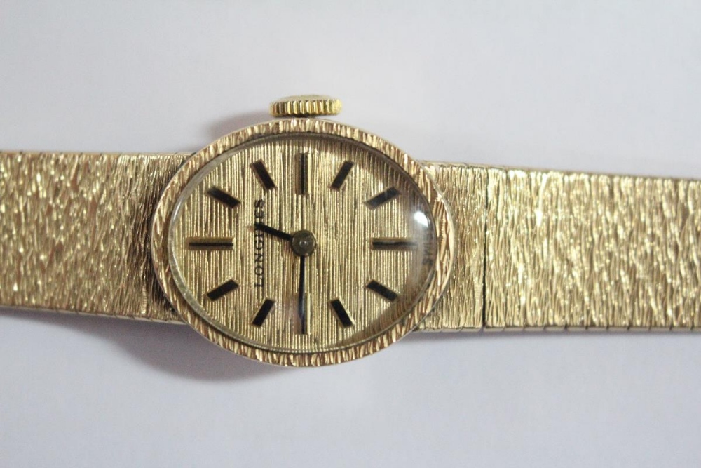 By Longines - a lady's 9ct gold cased wristwatch, the oval gold coloured dial with baton numerals, - Image 2 of 12