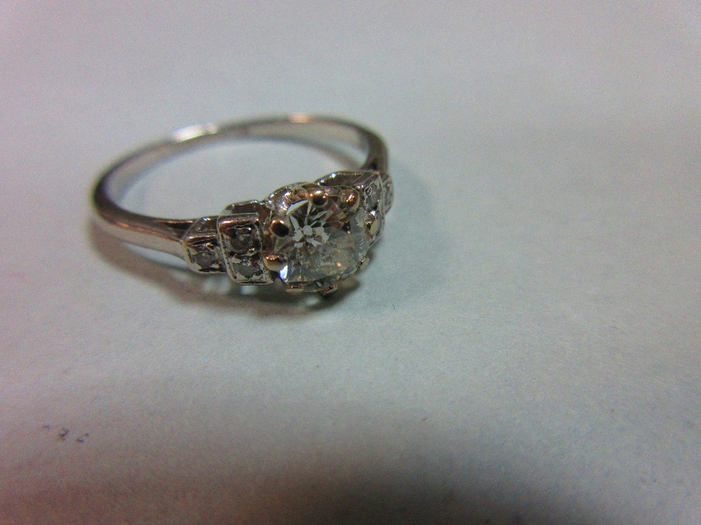 A diamond ring, the old round brilliant cut diamond claw set between stepped square millegrain edged - Image 4 of 5