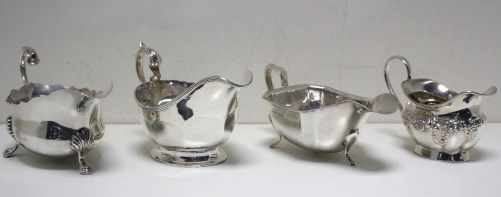 A small silver sauce boat, by Collingwood & Sons Ltd, Birmingham 1935, of oval panelled form