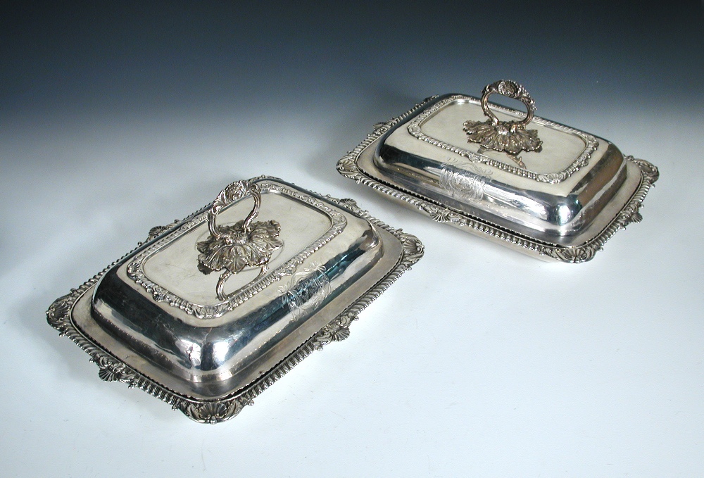 A pair of George III silver entree dishes and covers, by William Elliott, London 1818, each of