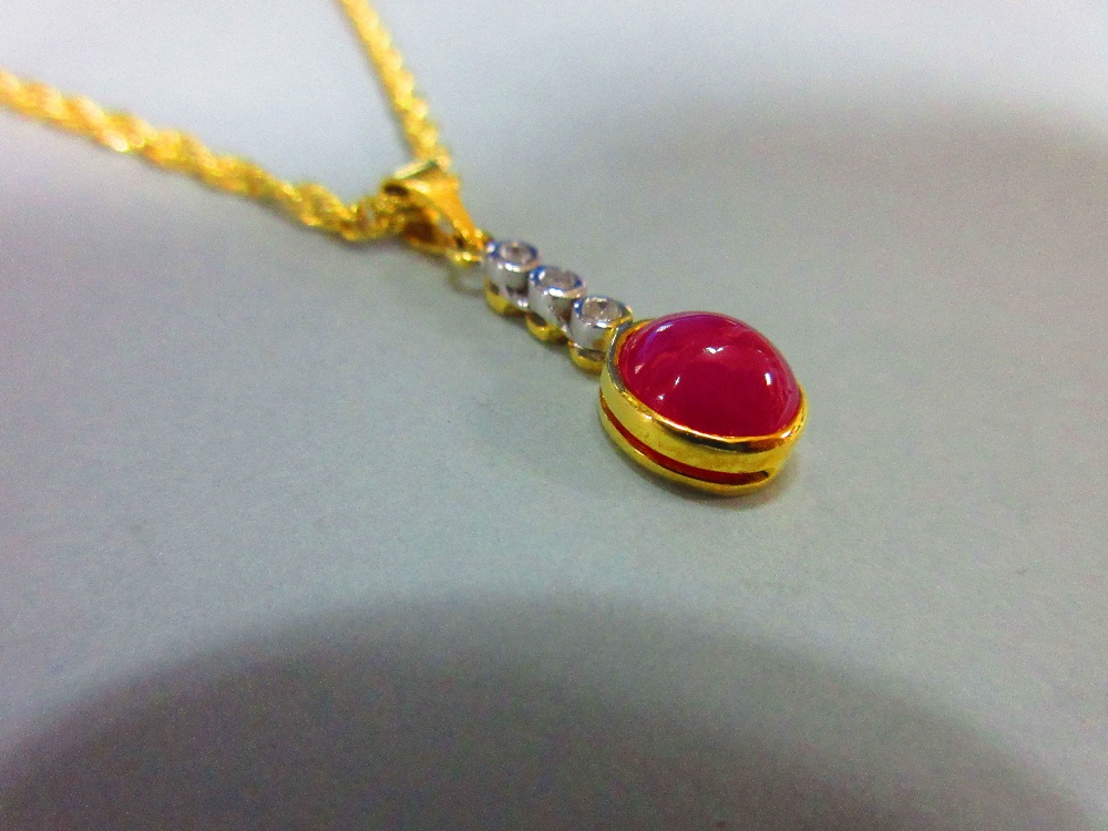 A ruby and diamond pendant with gold chain, the pendant designed as an articulated line of collet - Image 3 of 4