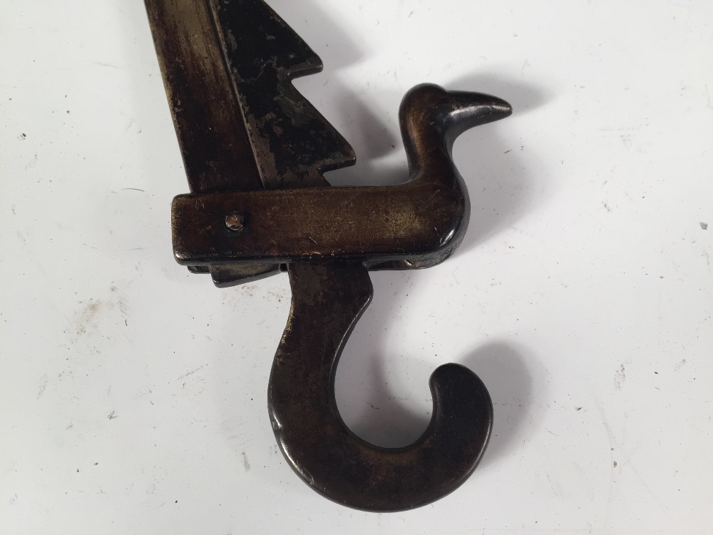 A late 18th/early 19th century brass adjustable pot hook, opposing hooks at each end, the saw - Image 3 of 3