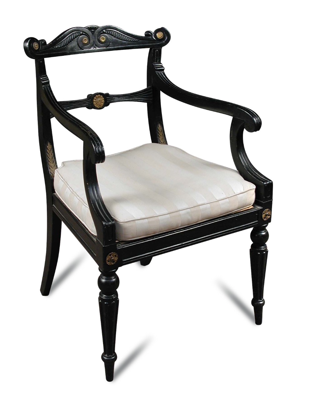 A Regency ebonised and gilt mounted elbow chair, with cane seat and squab, carved back, on gadroon