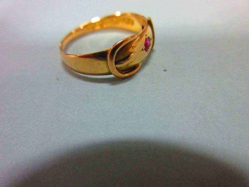 A Victorian 15ct gold buckle ring set with rubies, the two stones, one oval cut the other round cut, - Image 4 of 5
