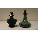 A 19th century Bohemian green lithyalin scent bottle and stopper together with a green glass scent