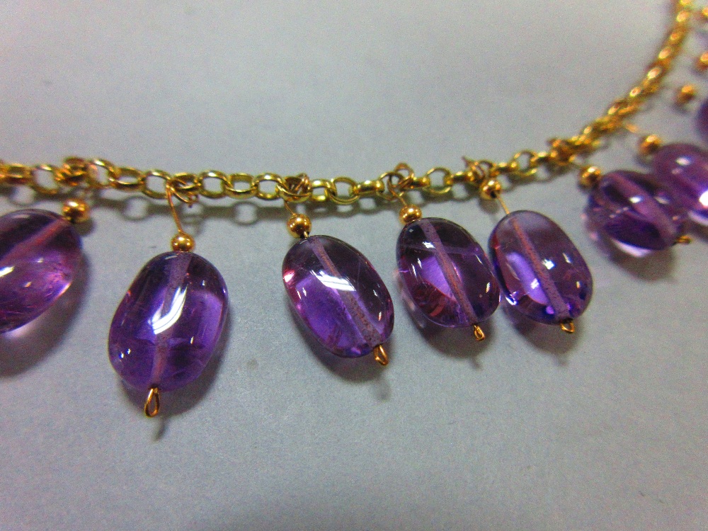 An amethyst fringe necklace, the unmarked yellow precious metal belcher link chain suspending evenly - Image 2 of 4