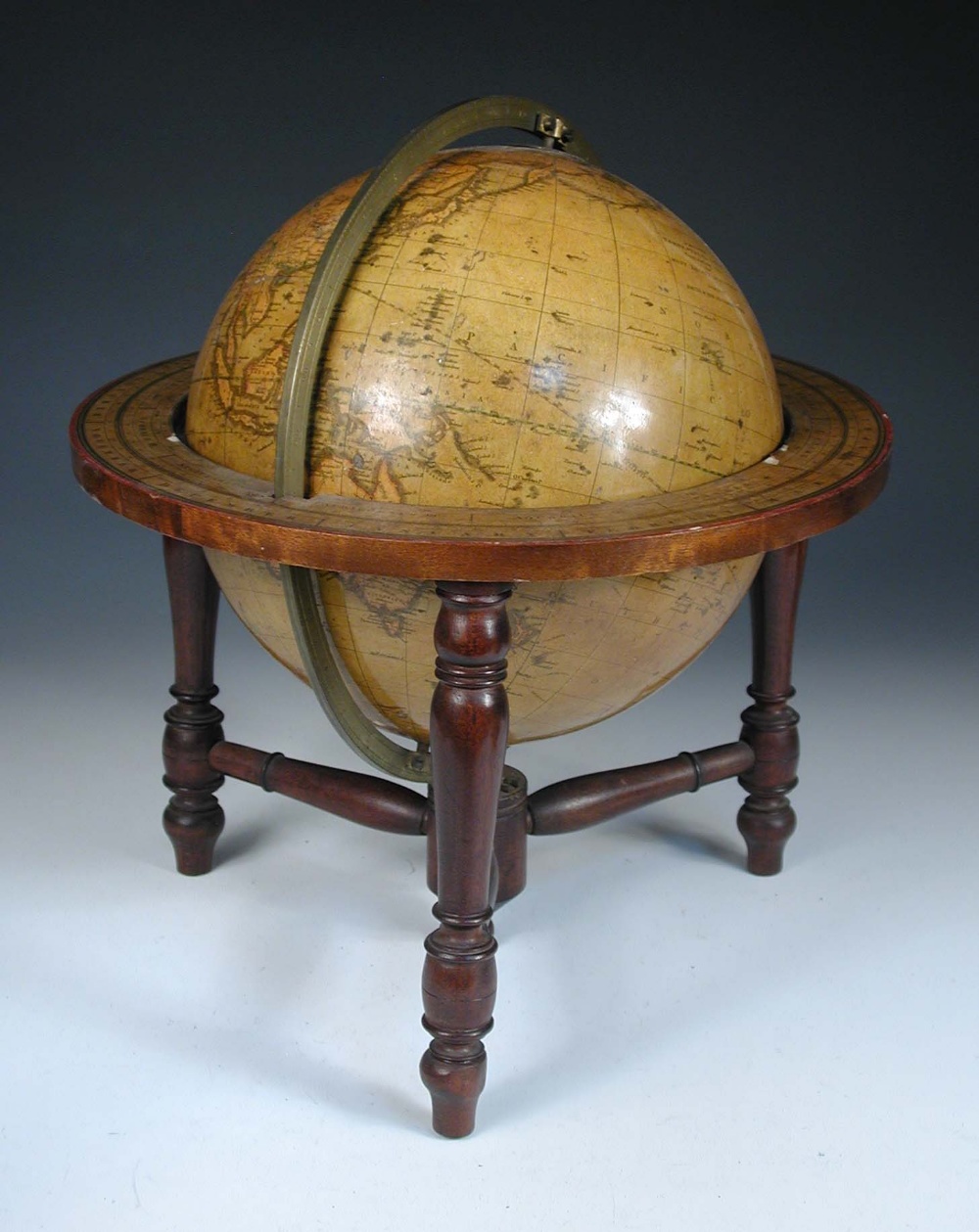 A Smith's Terrestial 10inch table Globe, 'containing all the most recent discoveries', varnished