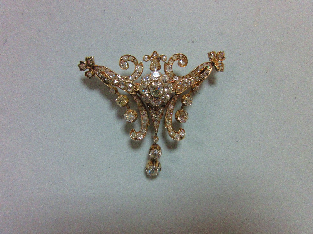 A late 19th century diamond stomacher / brooch, designed with a removeable central flowerhead - Image 2 of 12