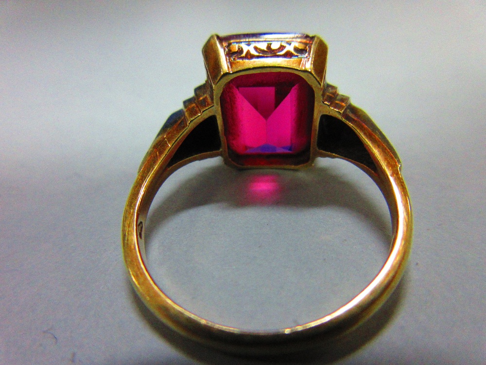 An Austrian single stone synthetic red spinel ring, the fancy cut rectangular pinky-red spinel, claw - Image 6 of 8