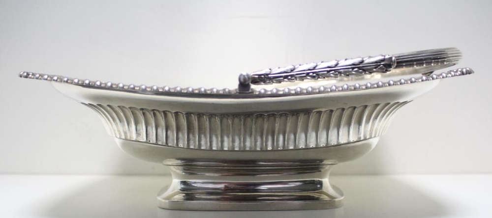 A Regency silver cake basket, by Paul Storr, London 1816, of rectangular shape, the body part fluted - Image 7 of 7