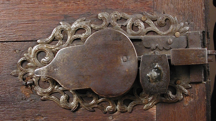 A 17th century Flemish oak panelled armoire, the frieze carved with monogram and date 1694, a - Image 2 of 5